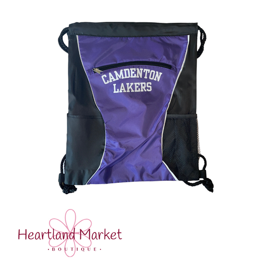 Purple center with black outsides drawstring bag with text "Camdenton Lakers" with 2 mesh side pockets. 